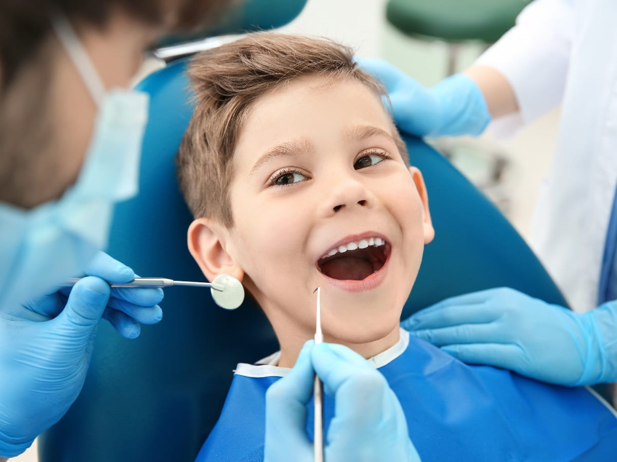 Smiling Kid At Dentist