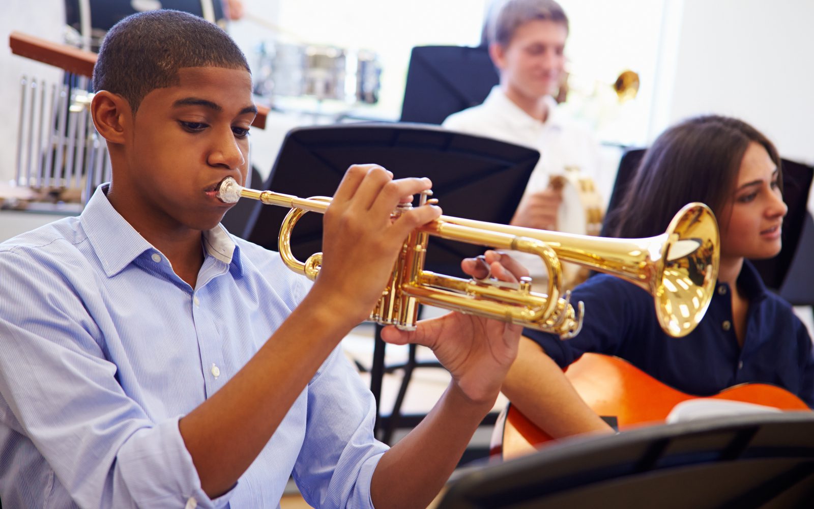 Child playing trumpet